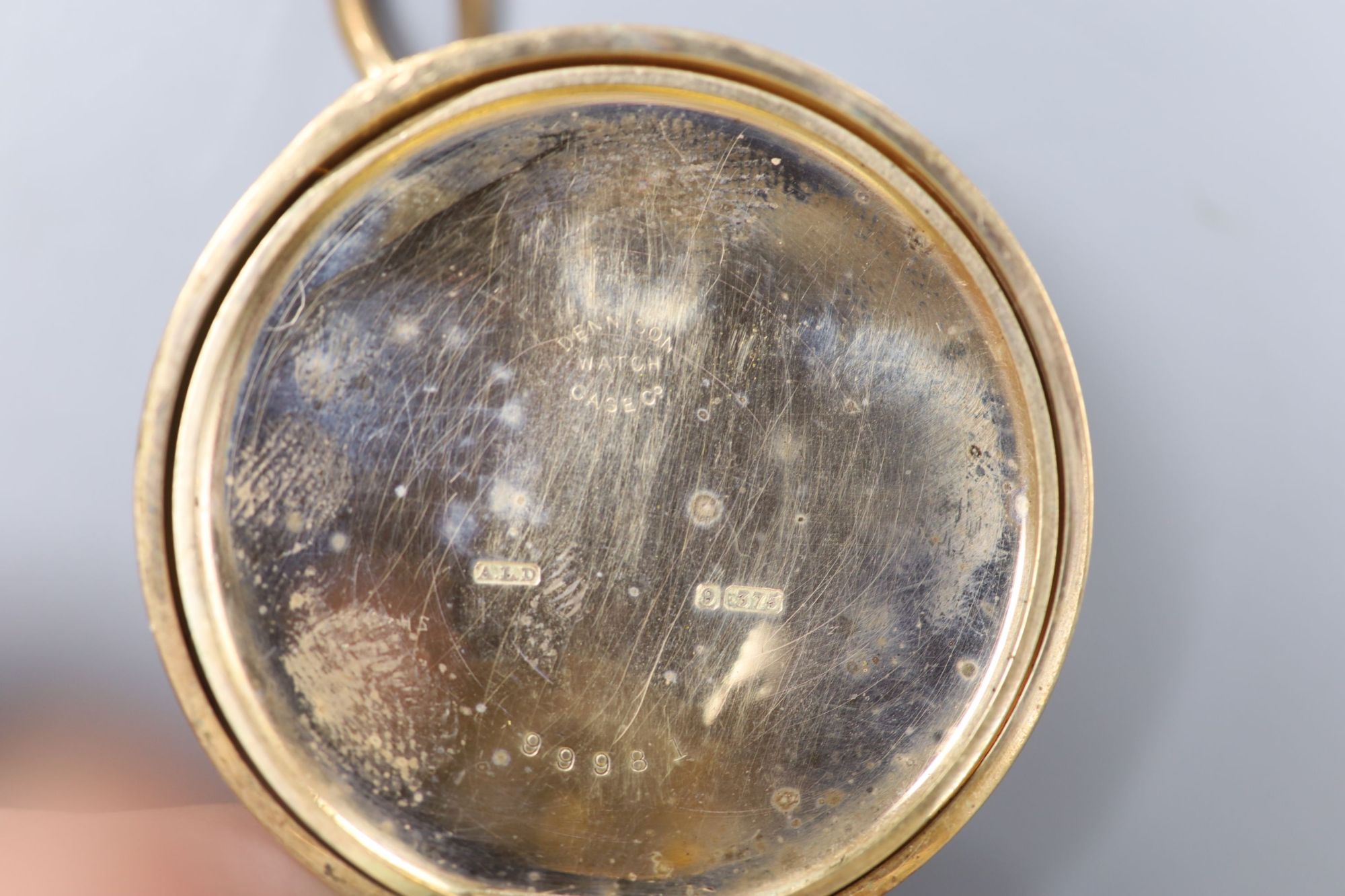A George V 9ct gold Waltham half hunter pocket watch, with a 9ct gold albert.